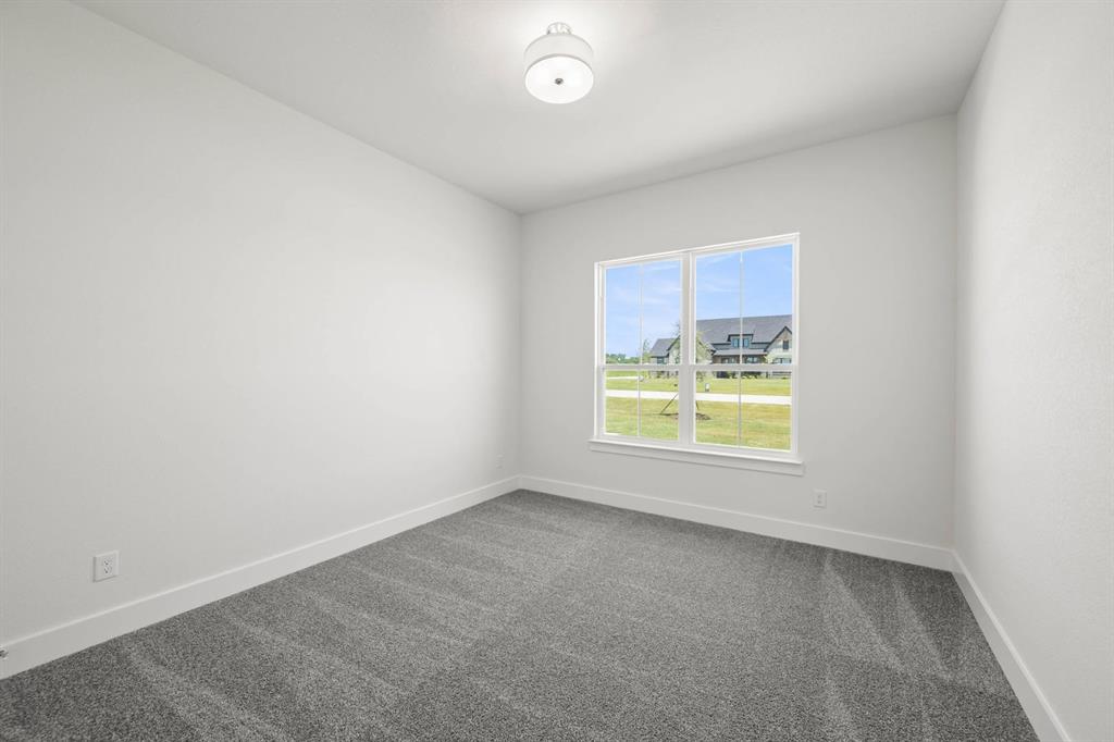 141 Olson Road Waxahachie, TX 75165 - Photo 14 of 24 an empty room with a window