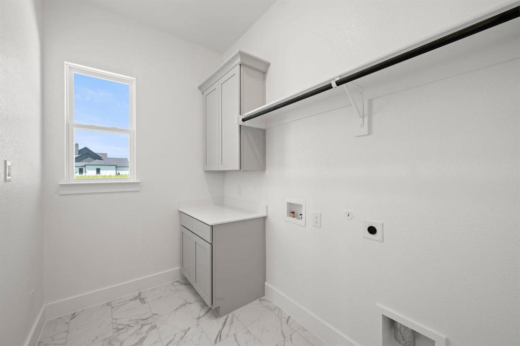 141 Olson Road Waxahachie, TX 75165 - Photo 16 of 24 a view of storage and utility room with wooden floor