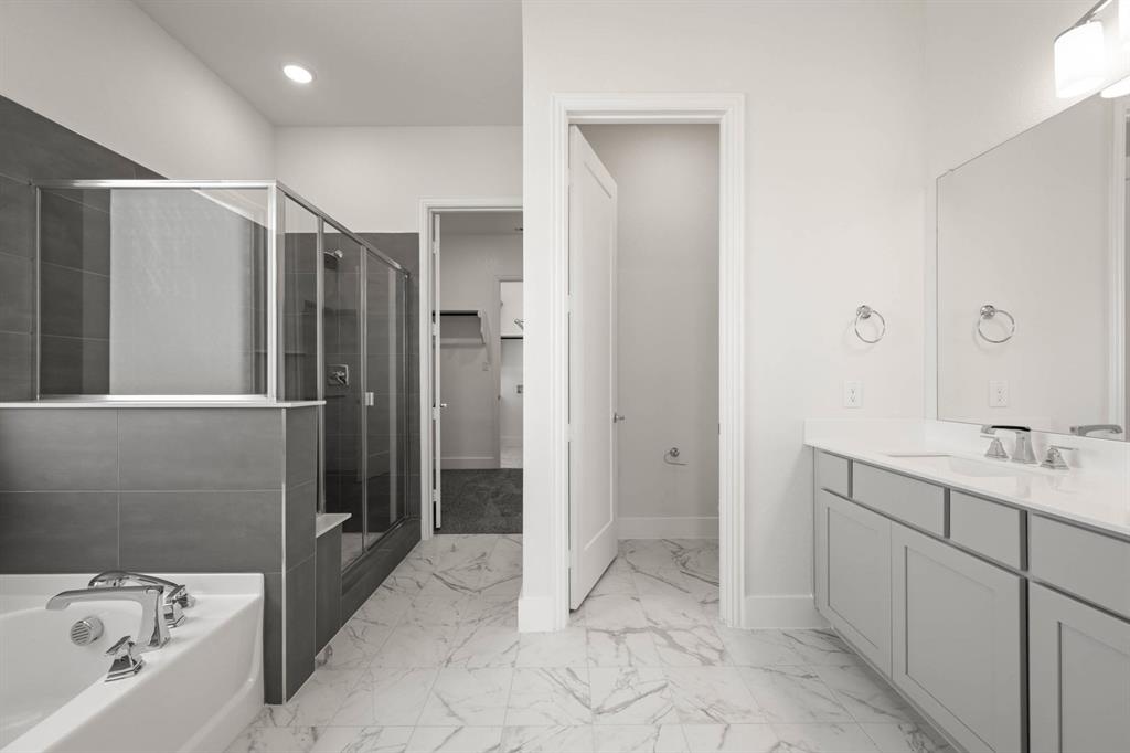 141 Olson Road Waxahachie, TX 75165 - Photo 19 of 24 a bathroom with a double vanity sink and mirror