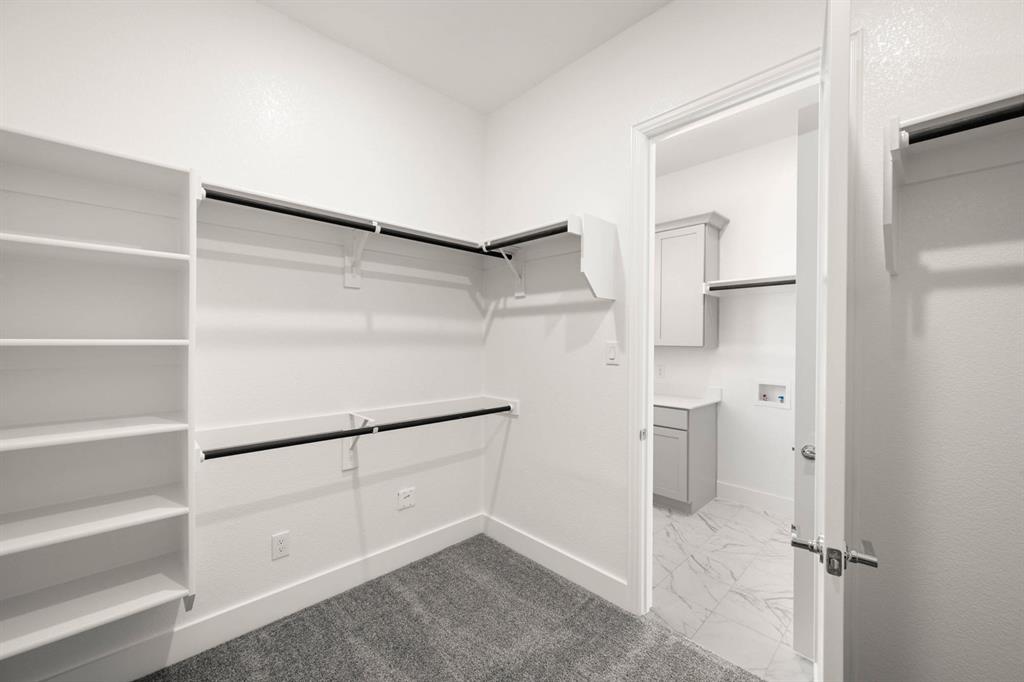 141 Olson Road Waxahachie, TX 75165 - Photo 24 of 24 a view of walk in closet with empty racks