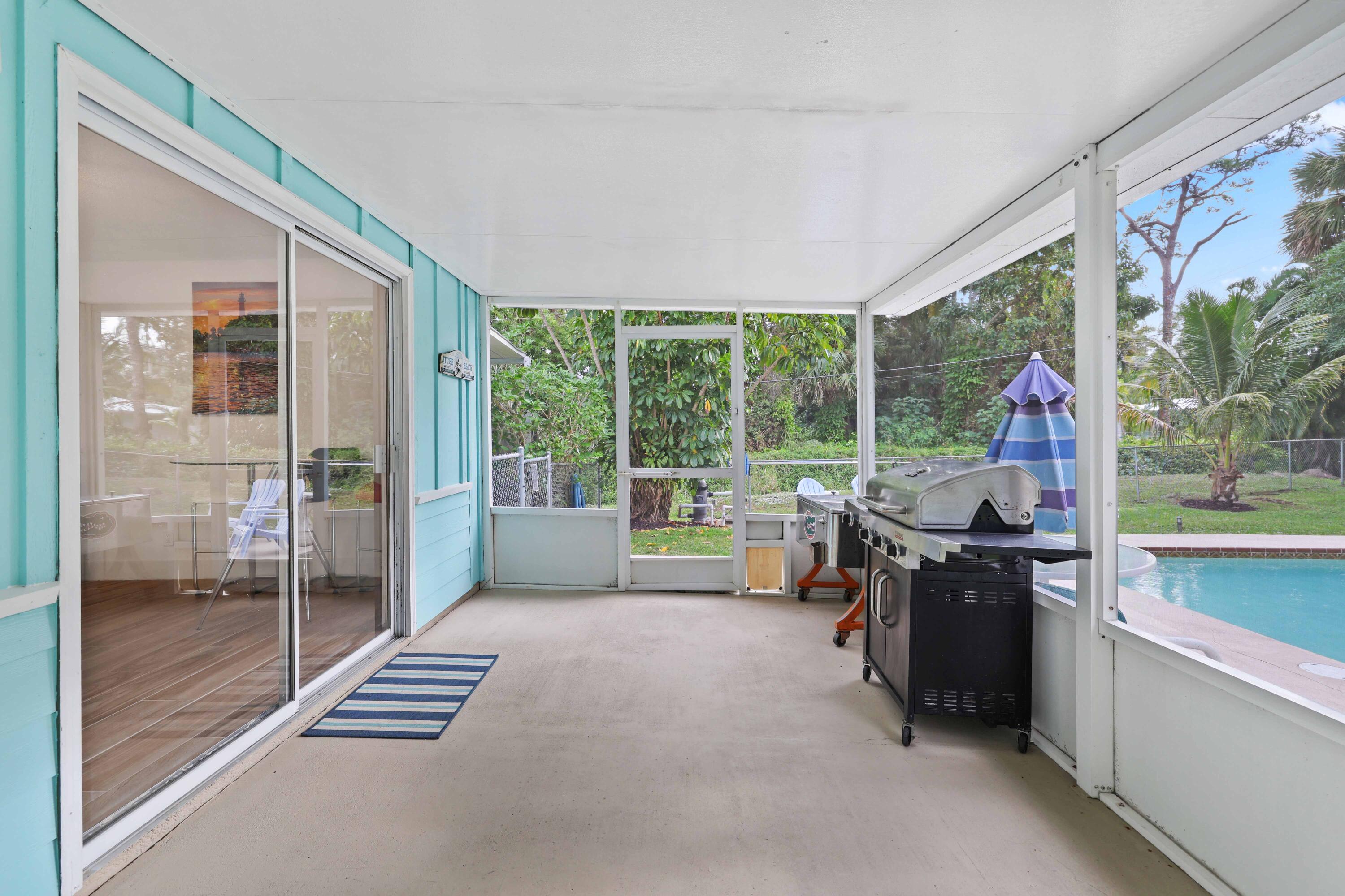 5554 Hibiscus Road Jupiter, FL 33458 - Photo 42 of 66 Screened Patio Door