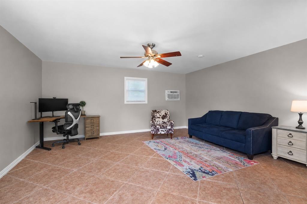 410 Simmons Road Double Oak, TX 75077 - Photo 39 of 40 This detached, climate-controlled guest quarters delivers flexible space just steps from the main home.