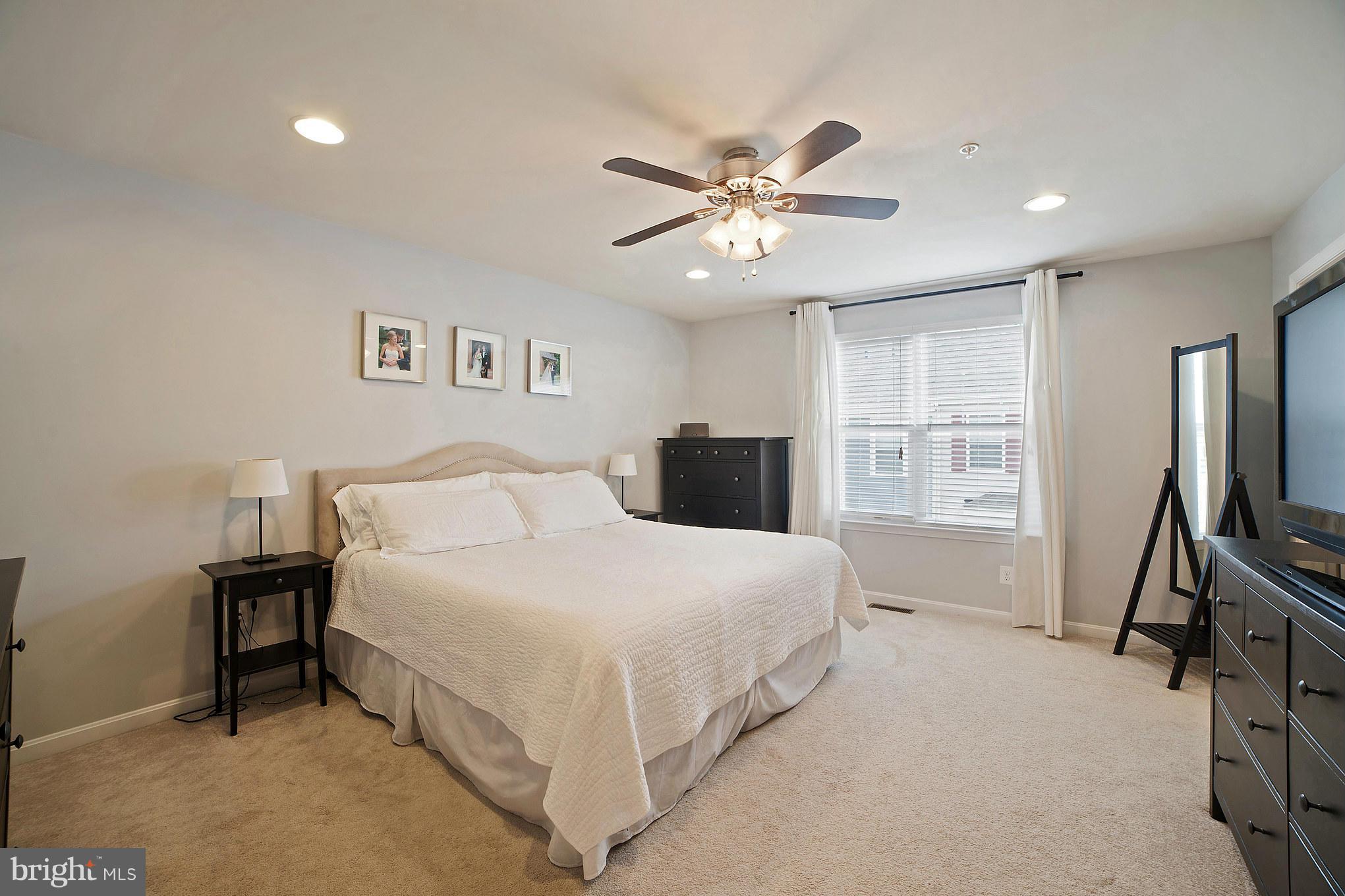2041 Case Road Baltimore, MD 21222 - Photo 22 of 30 a bedroom with a bed and a flat screen tv