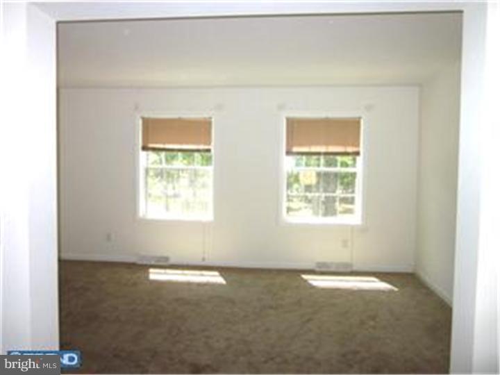114 Sooy Place Road Tabernacle, NJ 08088 - Photo 8 of 24 a view of empty room with window