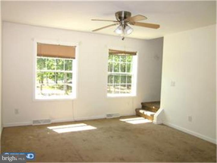 114 Sooy Place Road Tabernacle, NJ 08088 - Photo 9 of 24 a view of a livingroom with a window and a kitchen