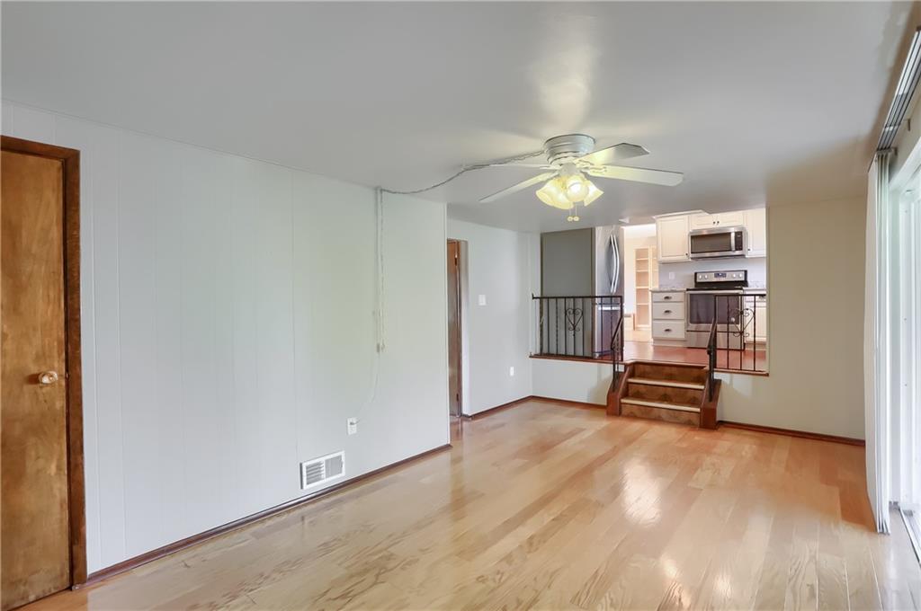 2202 Altaview Avenue Pittsburgh, PA 15226 - Photo 13 of 25 wooden floor in an empty room with a window