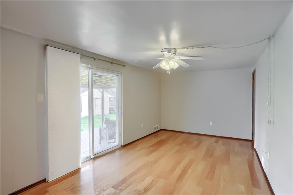 2202 Altaview Avenue Pittsburgh, PA 15226 - Photo 14 of 25 a view of an empty room with wooden floor and a window