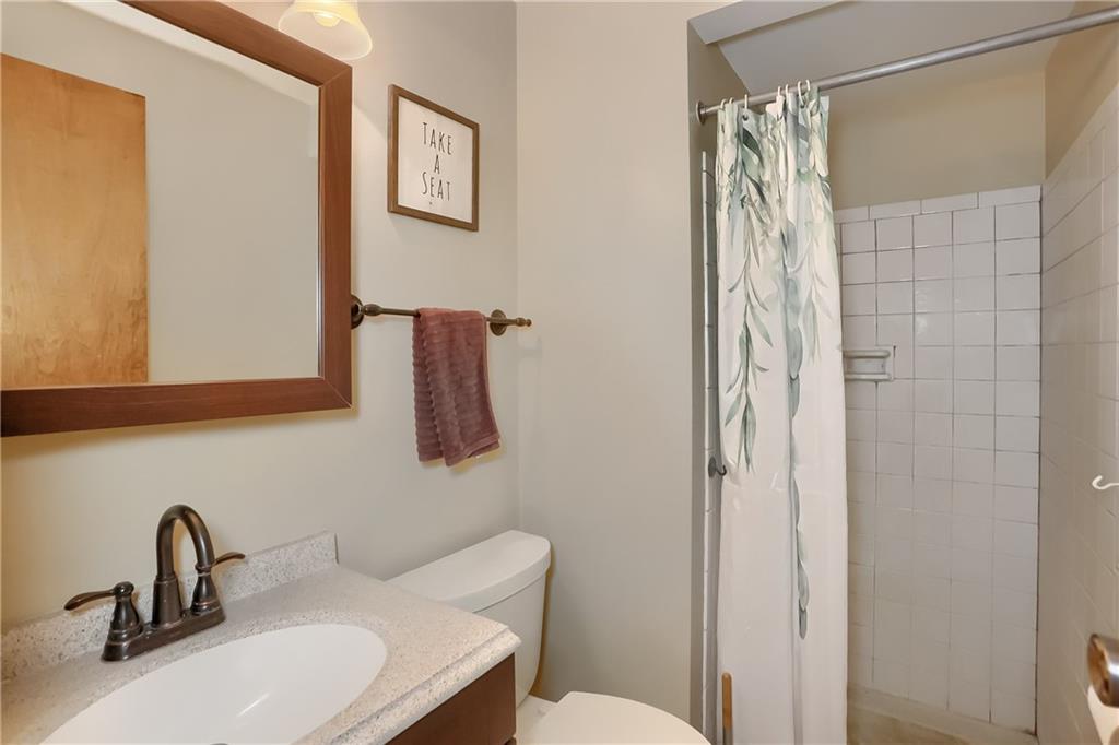 2202 Altaview Avenue Pittsburgh, PA 15226 - Photo 15 of 25 a bathroom with a sink toilet and shower