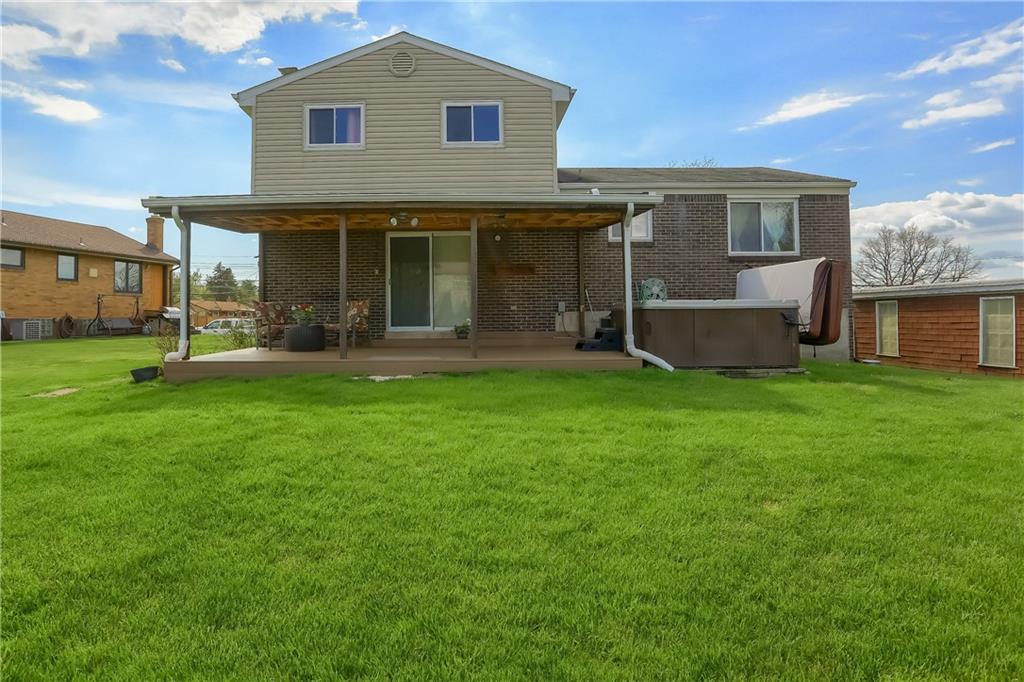 2202 Altaview Avenue Pittsburgh, PA 15226 - Photo 2 of 25 a front view of a house with a yard and trees