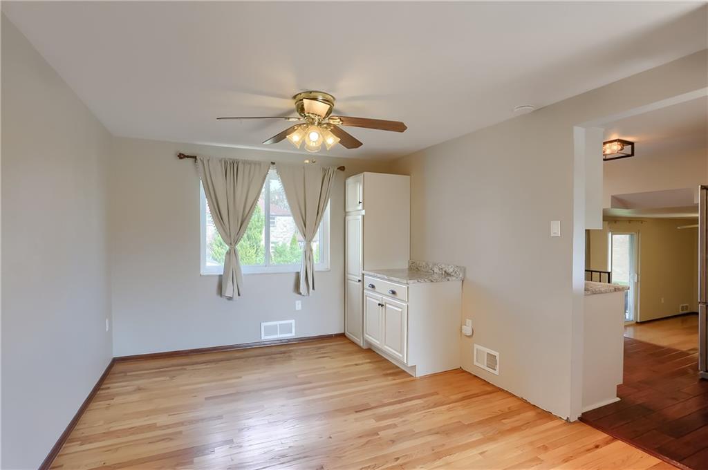 2202 Altaview Avenue Pittsburgh, PA 15226 - Photo 9 of 25 wooden floor in an empty room with a window