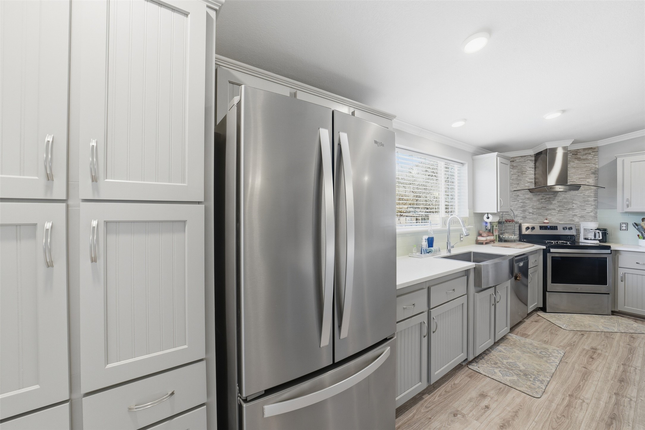 4007 Nancy Lane, Unit C546B Rosharon, TX 77583 - Photo 16 of 50 a kitchen with stainless steel appliances granite countertop a refrigerator and a stove top oven