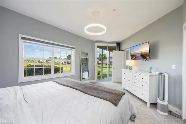 a bedroom with furniture and windows