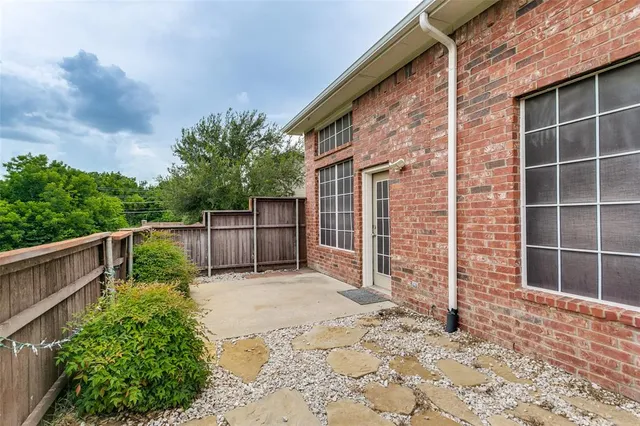 a view of backyard with green space