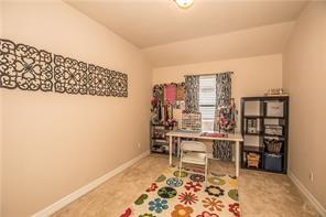1409 Rosson Road Little Elm, TX 75068 - Photo 7 of 34 Carpeted room with a window featuring horizontal blinds and decorative curtains