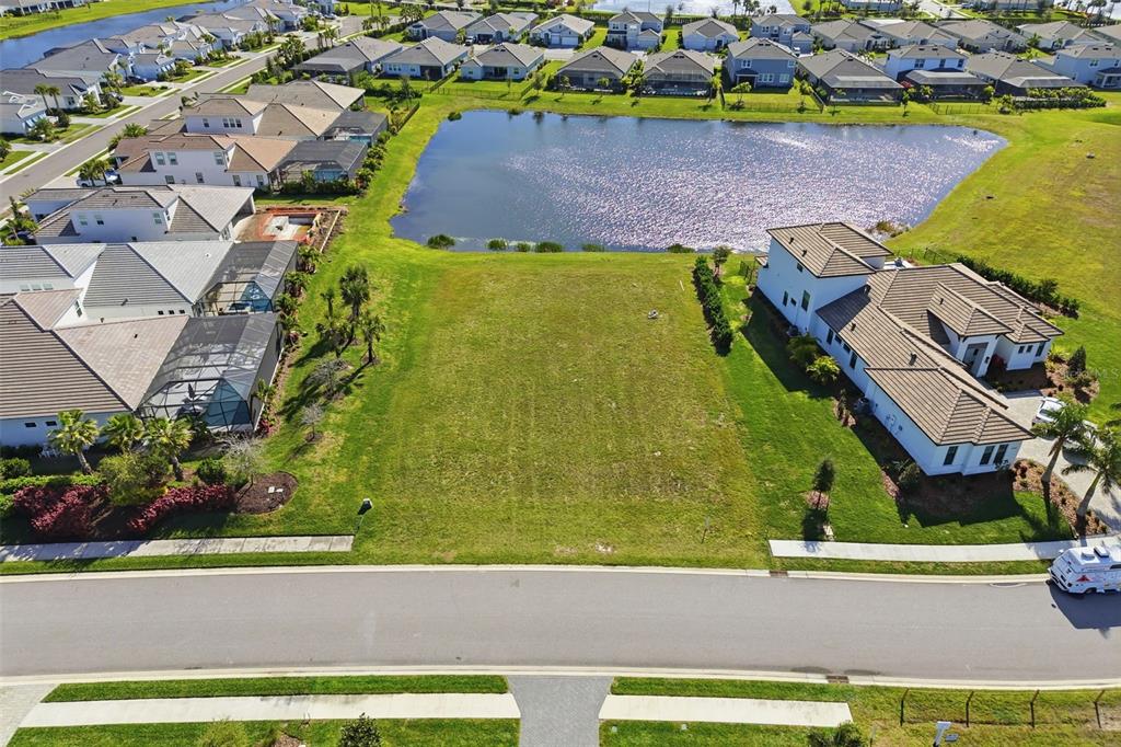 an aerial view of a house with a swimming pool