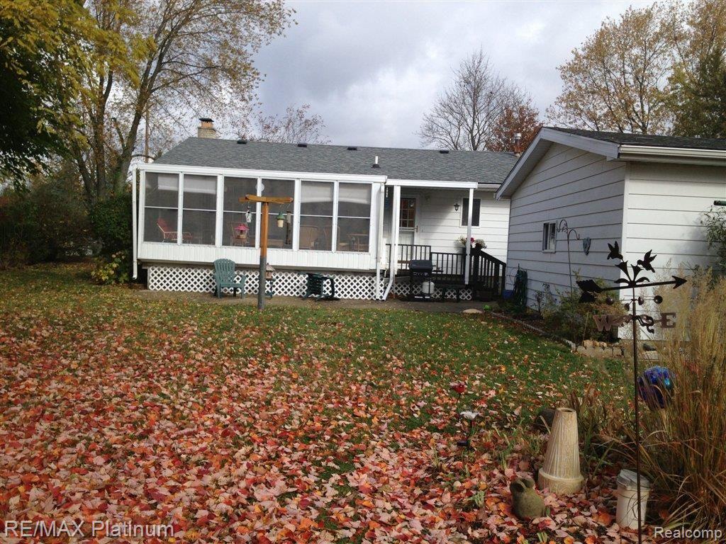 10412 Buno Road Brighton, MI 48114 - Photo 1 of 13 Back of Home Buno Rd.JPG