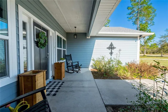 a front view of a house with patio
