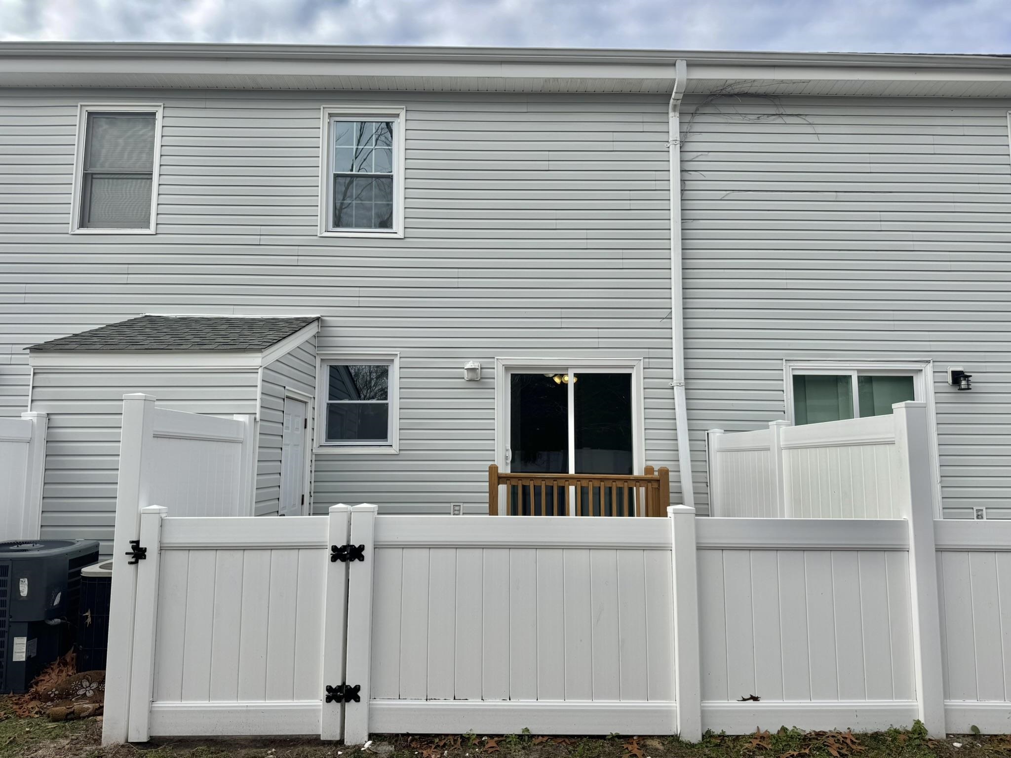4115 Little River Road, Unit 10B Myrtle Beach, SC 29577 - Photo 18 of 31 Back of house featuring a gate