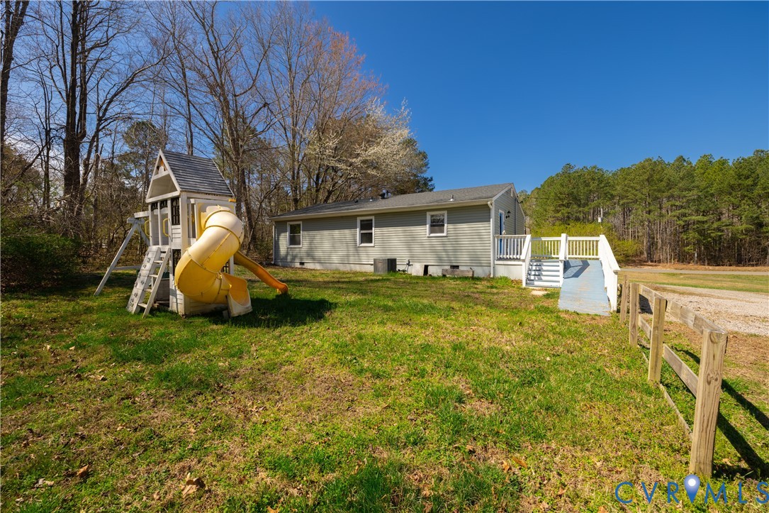 9813 Colemans Lake Road Ford, VA 23850 - Photo 28 of 38 a house view with a garden space