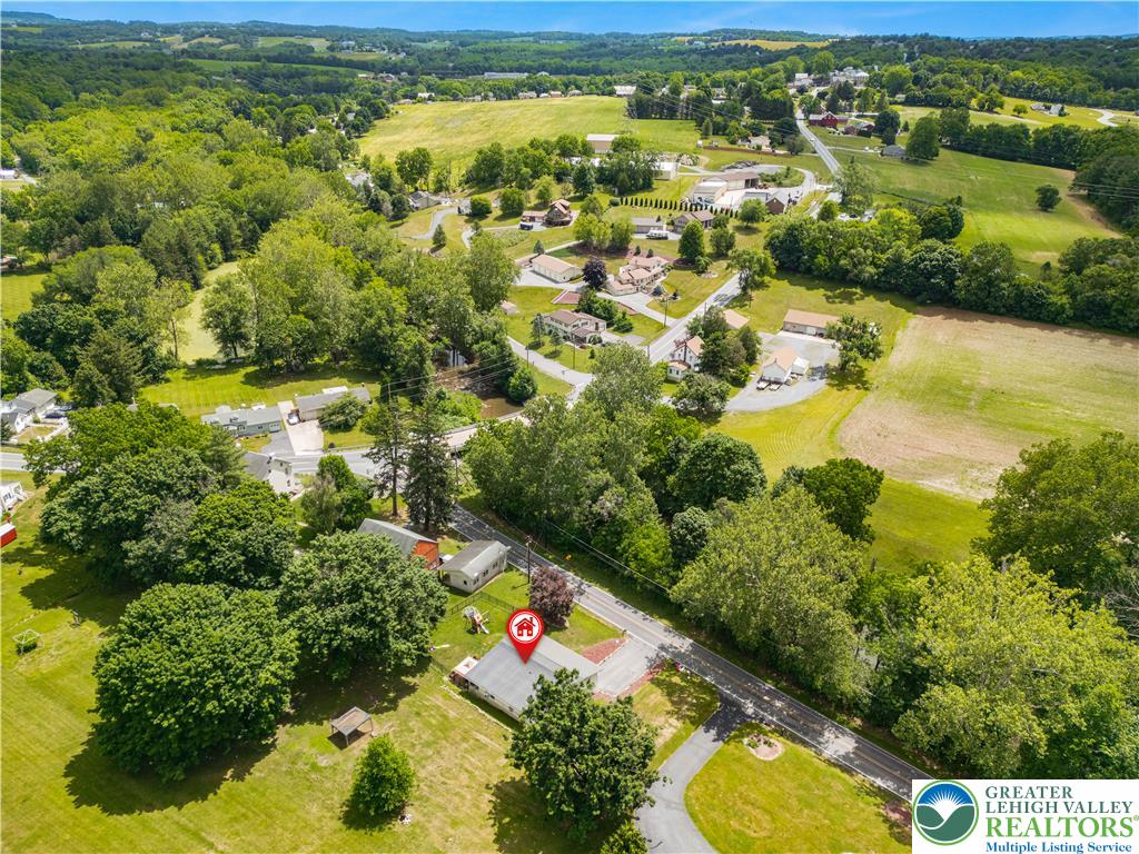 50 Kohls Road Northampton, PA 18067 - Photo 44 of 54 An aerial panorama reveals a vast green landscape with rural charm and residential pockets.