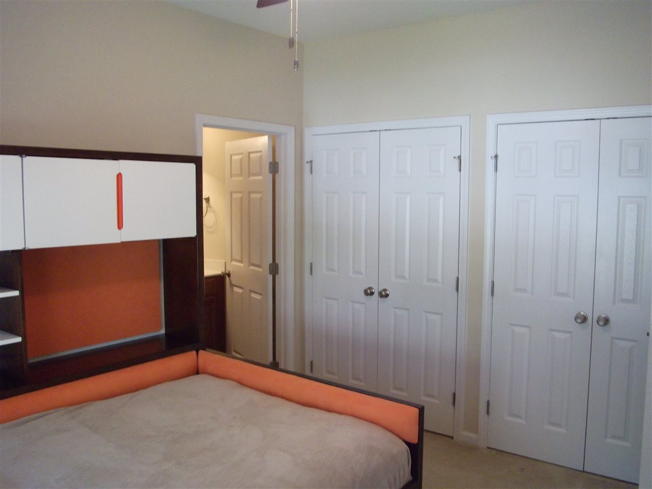 2993 Rolling Hill Road Durham, NC 27705 - Photo 24 of 25 The 4th bedroom upstairs has "own" full bath as well as double closets! Bedroom