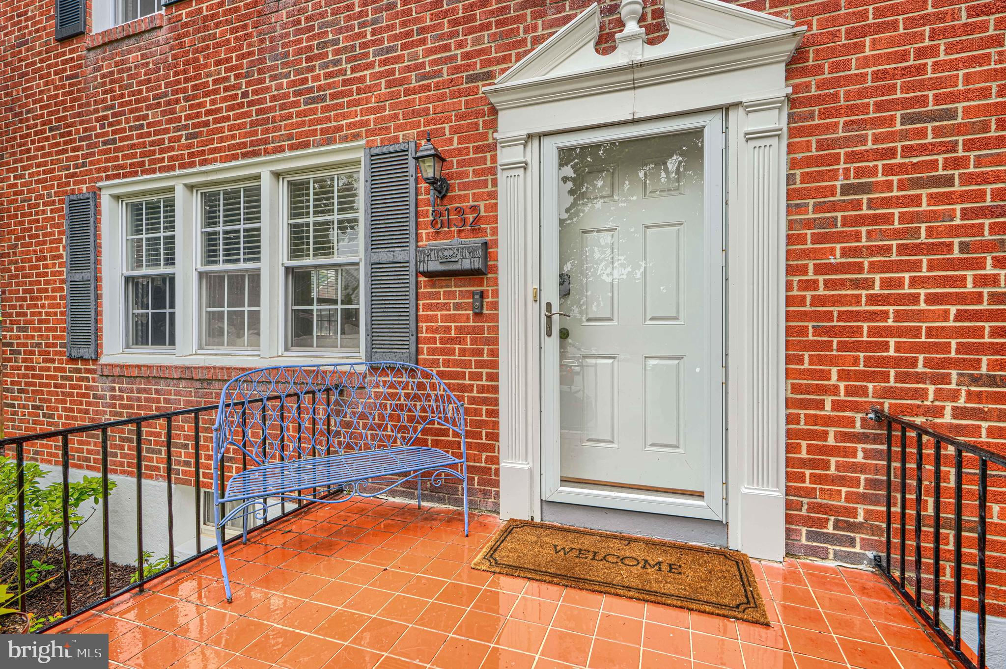 8132 Pleasant Plains Road Towson, MD 21286 - Photo 2 of 55 a view of a brick house with a large window