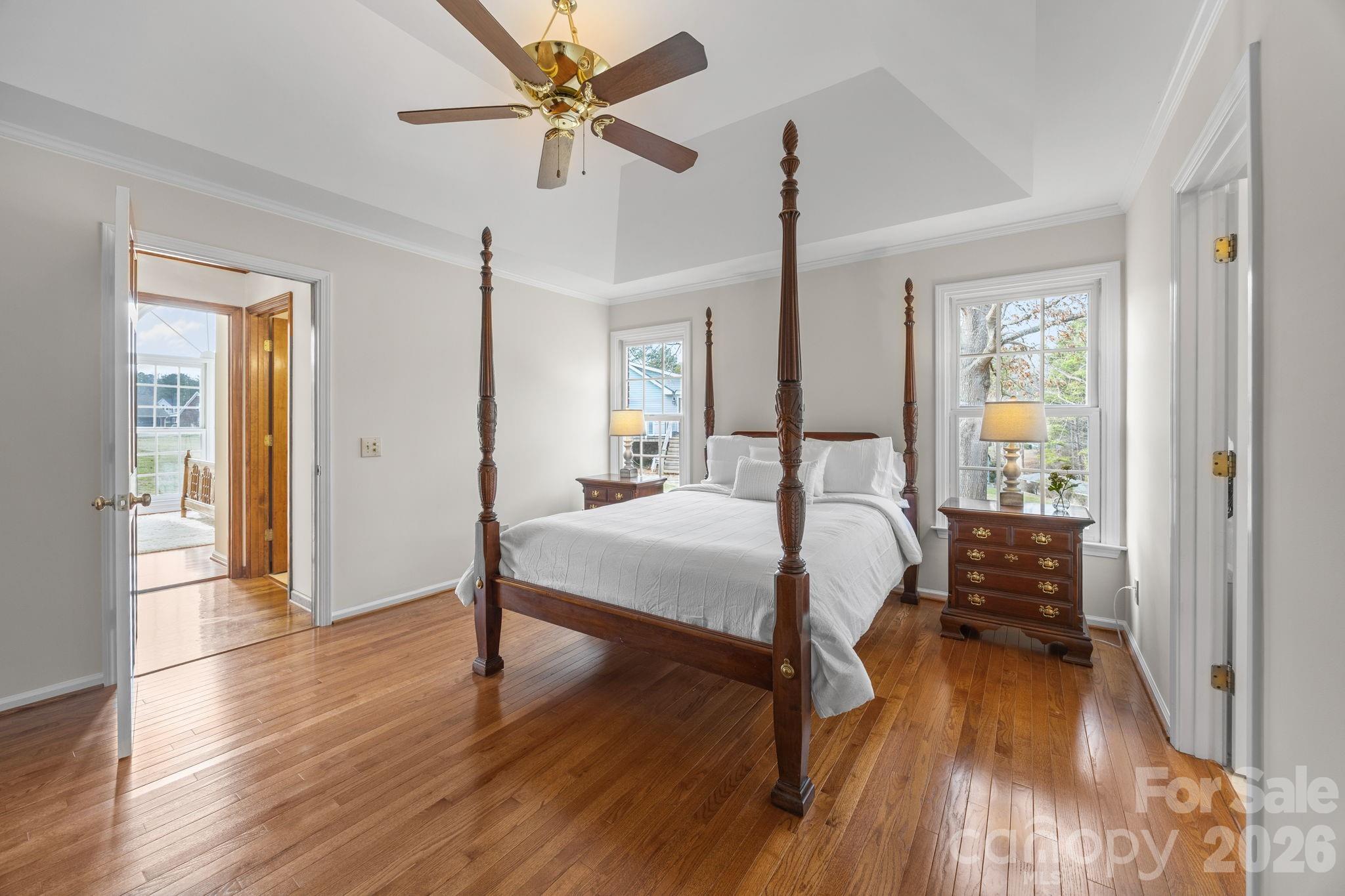 49449 River Run Road Albemarle, NC 28001 - Photo 15 of 45 a bedroom with a bed and wooden floor