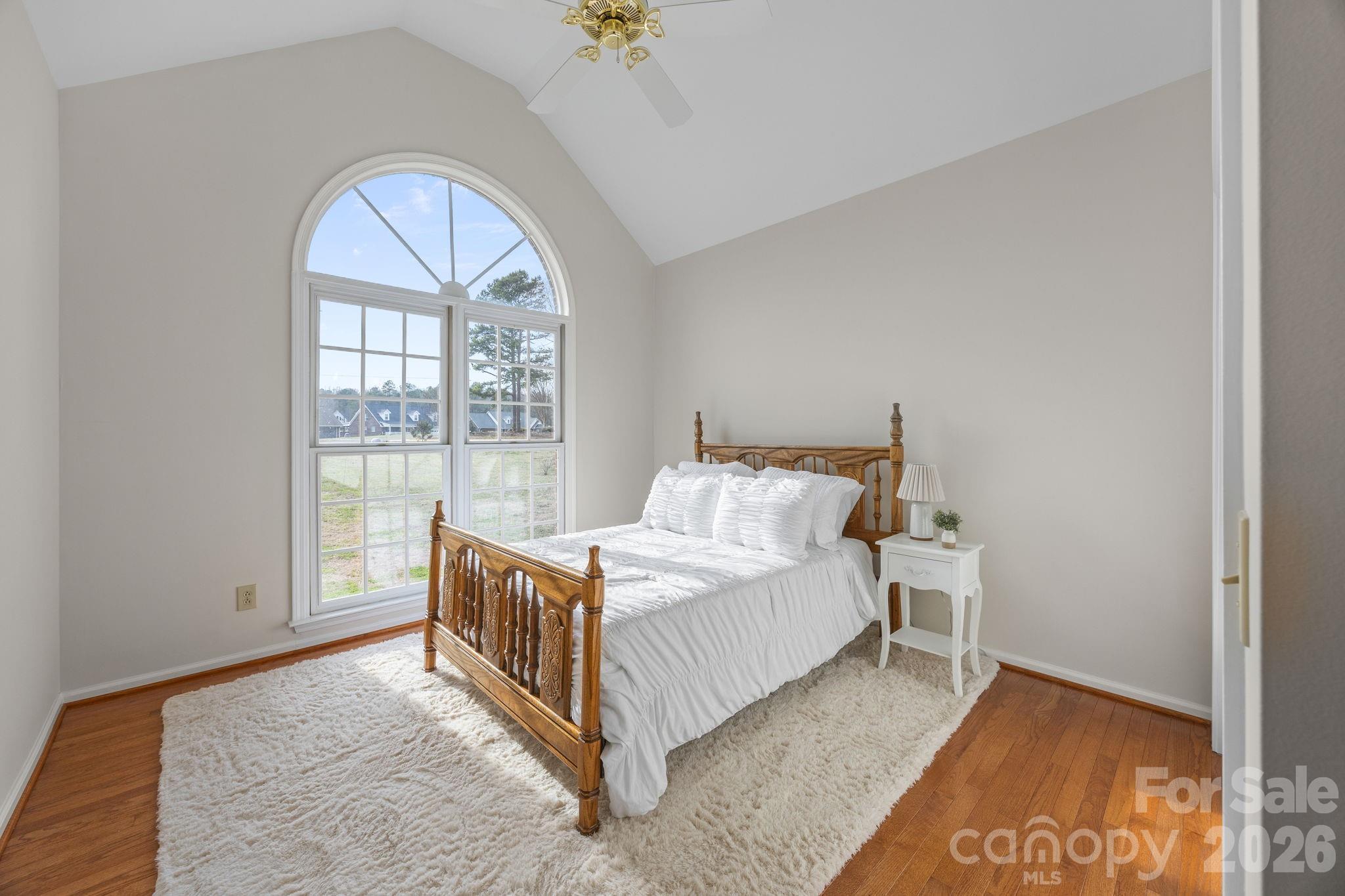 49449 River Run Road Albemarle, NC 28001 - Photo 20 of 45 a spacious bedroom with a bed and a window