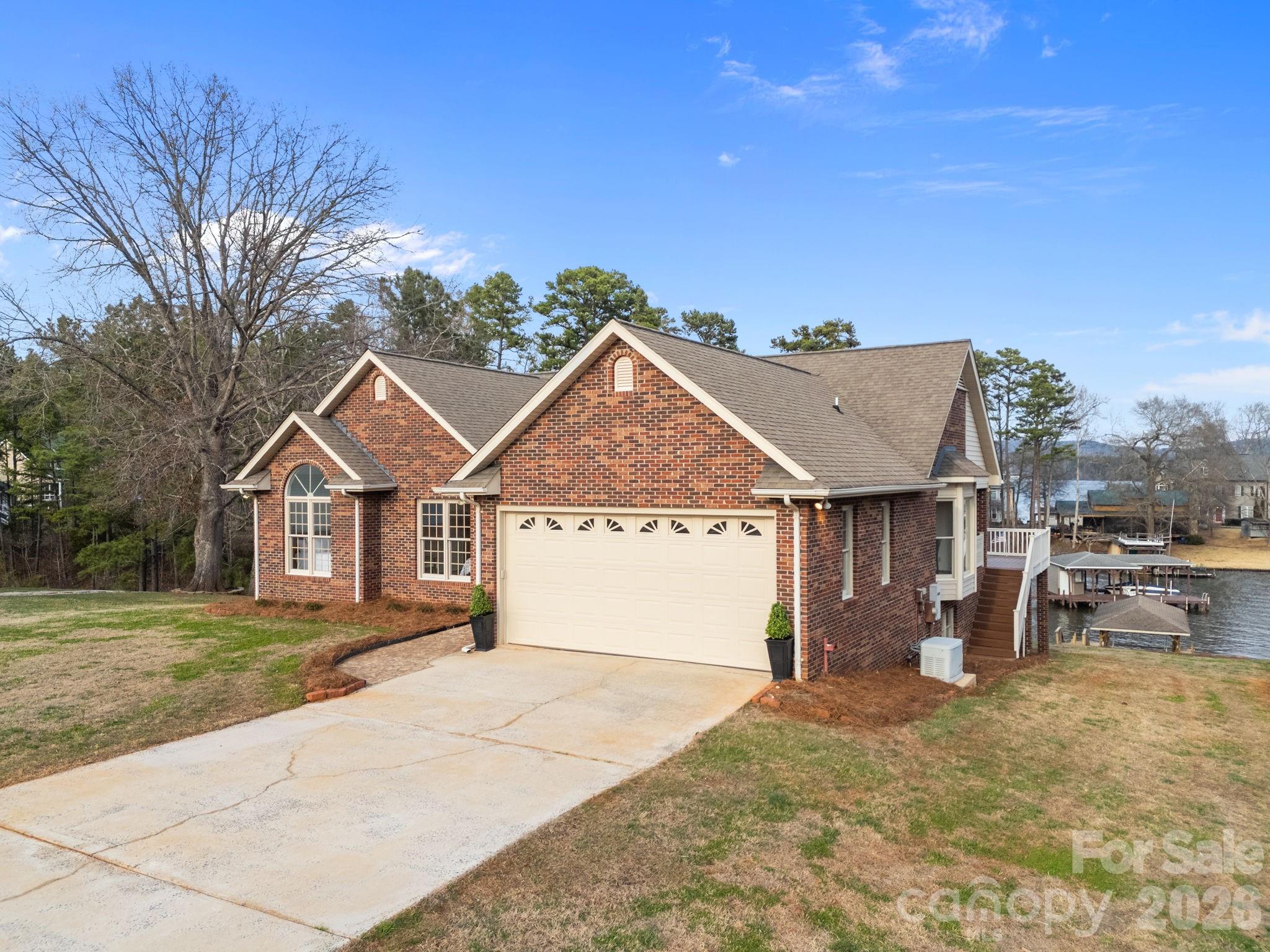 49449 River Run Road Albemarle, NC 28001 - Photo 2 of 45 front view of a house with a yard