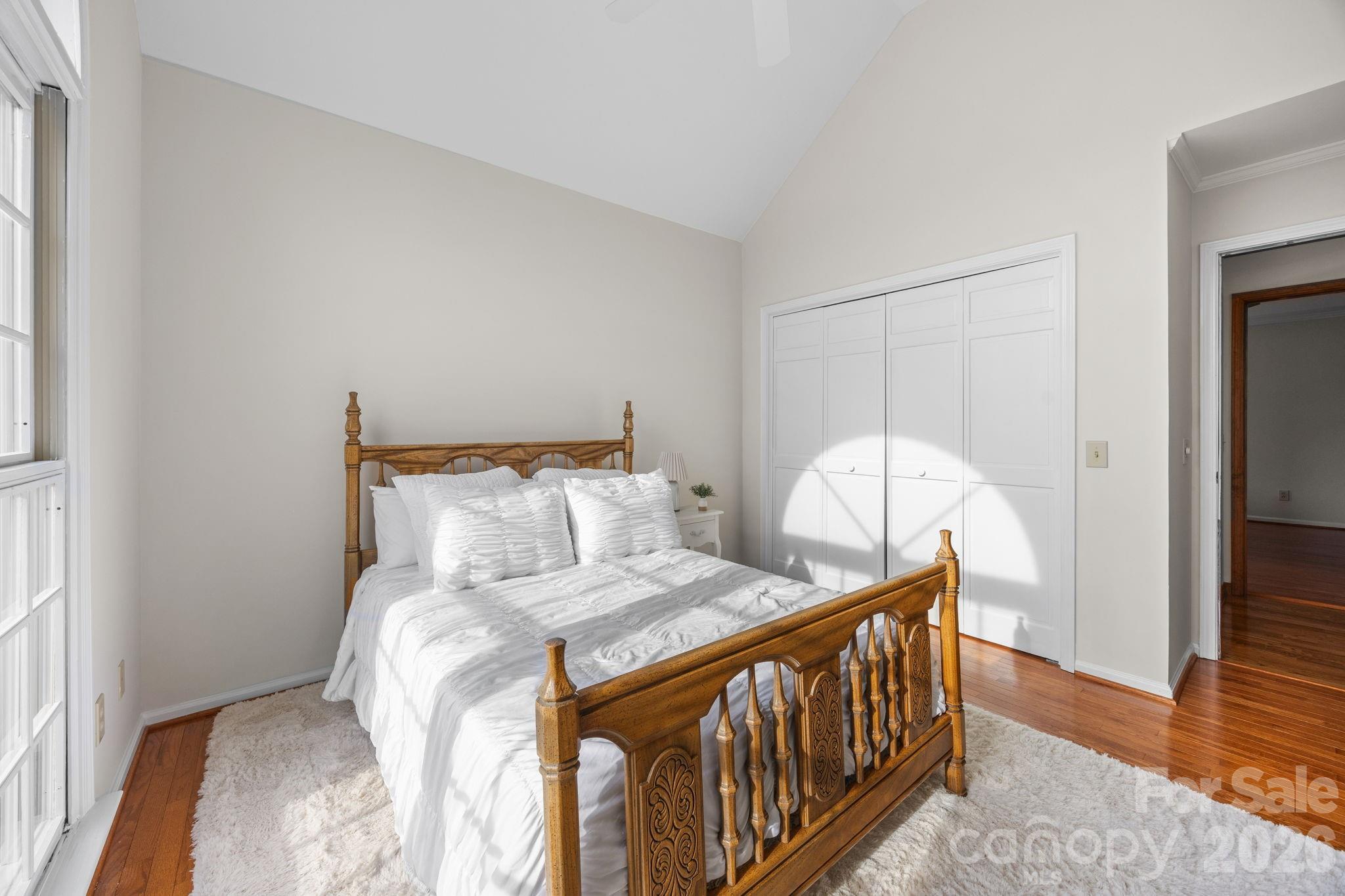49449 River Run Road Albemarle, NC 28001 - Photo 21 of 45 a bedroom with a bed and a large window