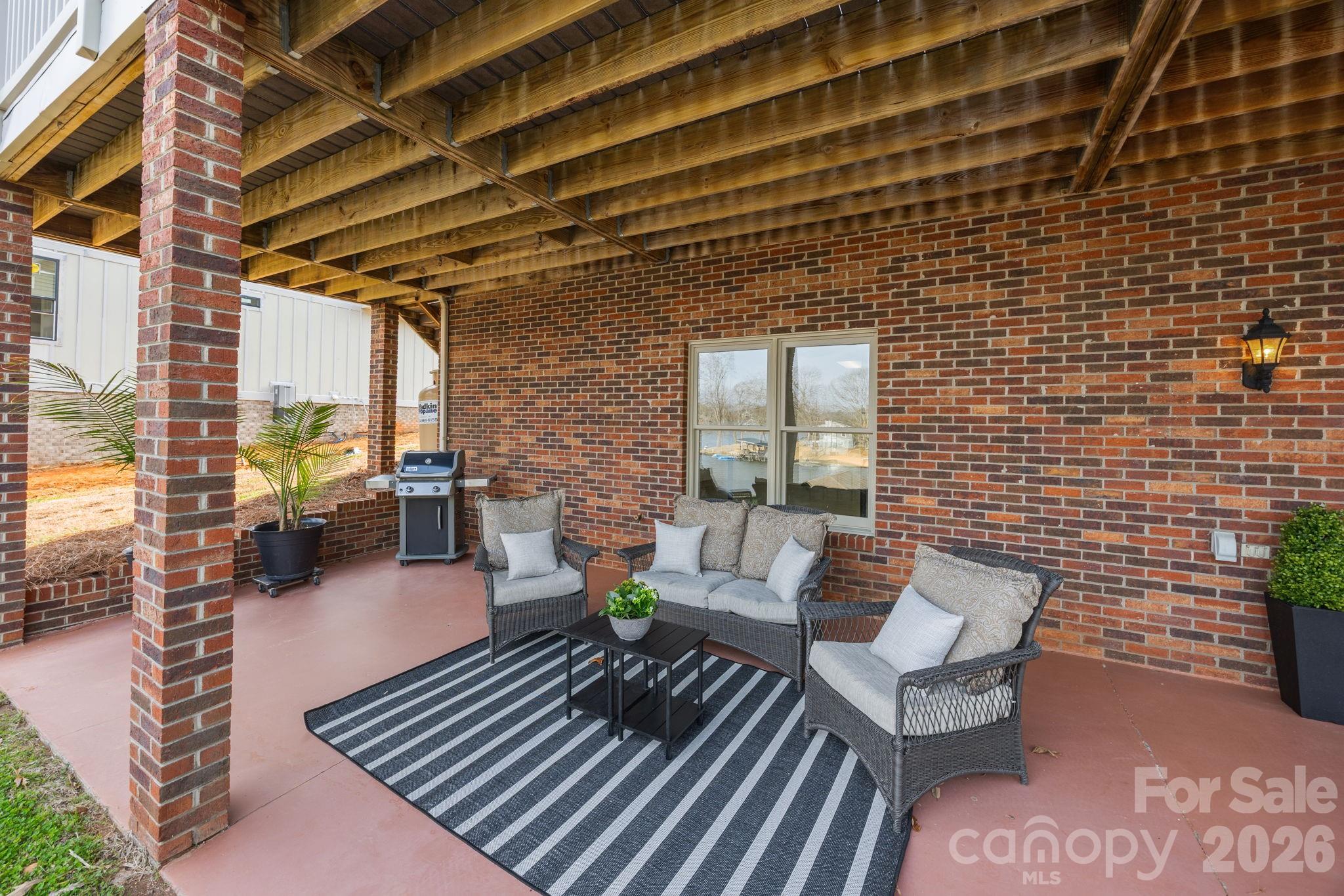 49449 River Run Road Albemarle, NC 28001 - Photo 30 of 45 a view of a patio with couches and potted plants