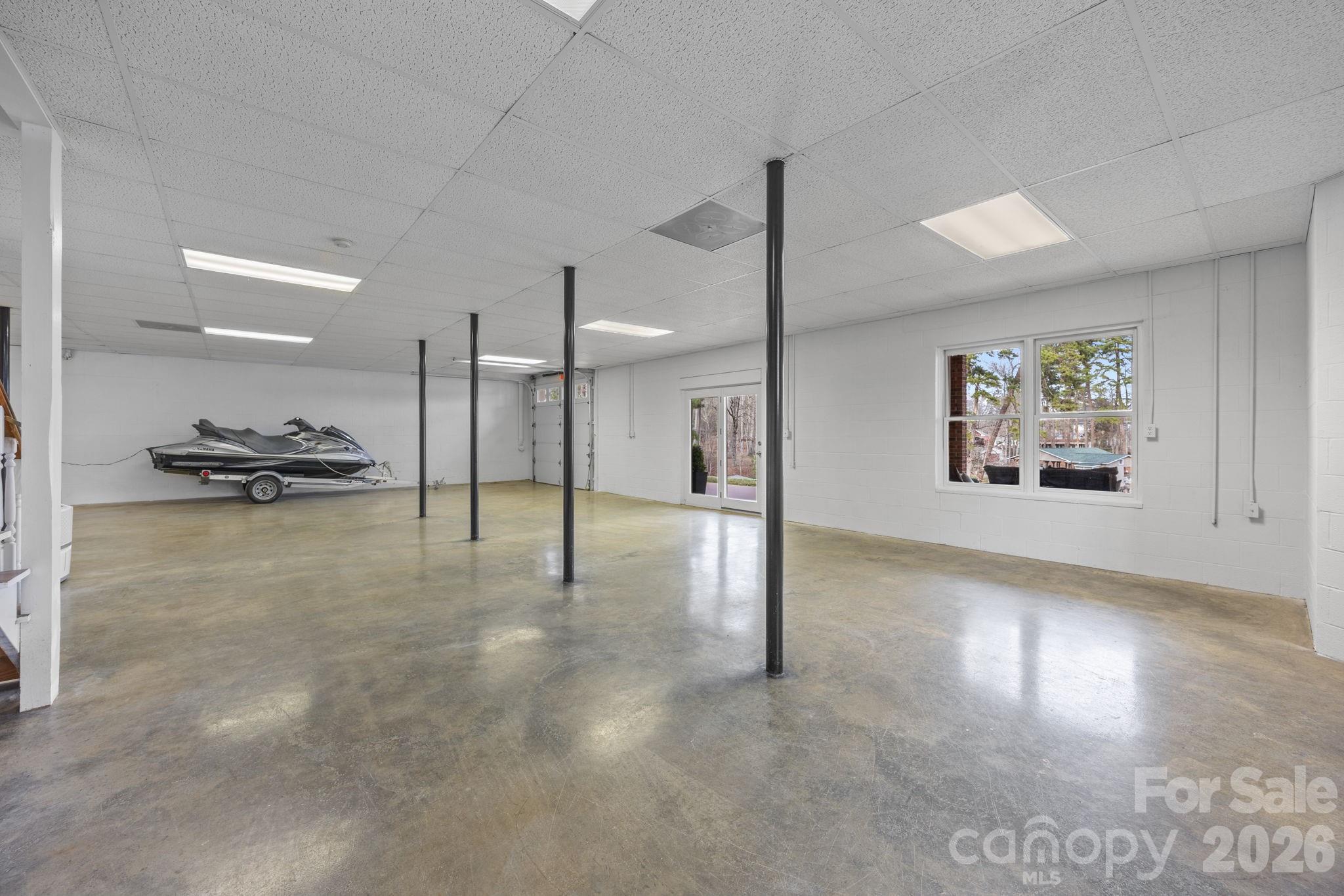 49449 River Run Road Albemarle, NC 28001 - Photo 32 of 45 a view of an empty room and a kitchen