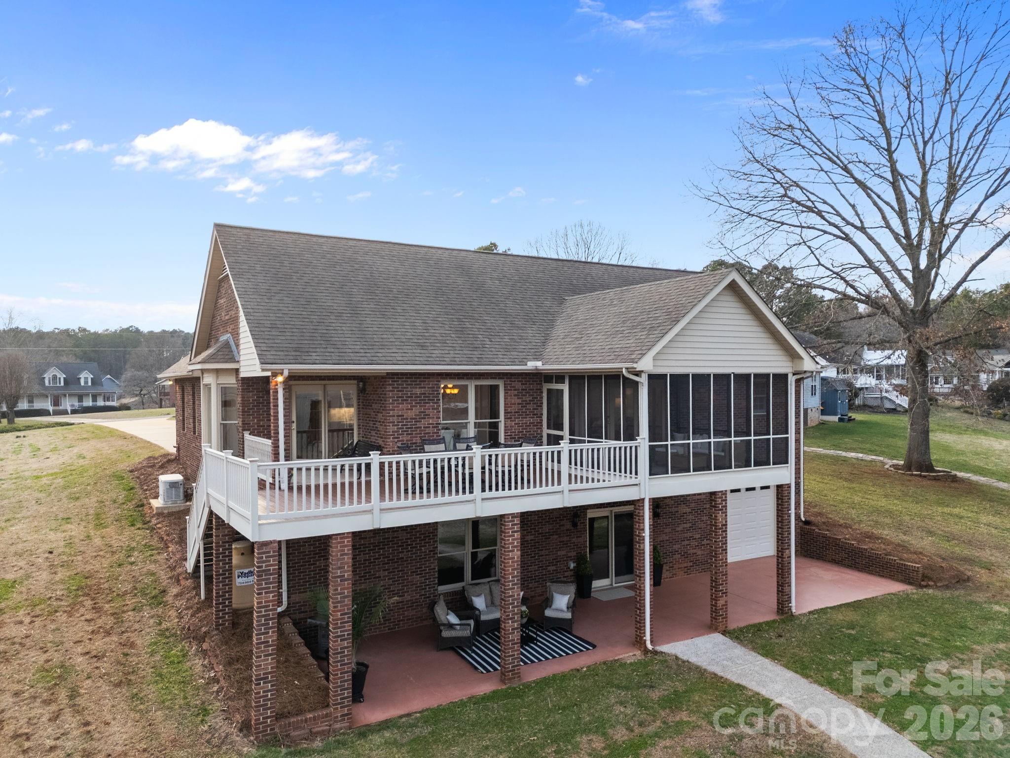 49449 River Run Road Albemarle, NC 28001 - Photo 35 of 45 a view of a house with backyard porch and sitting area