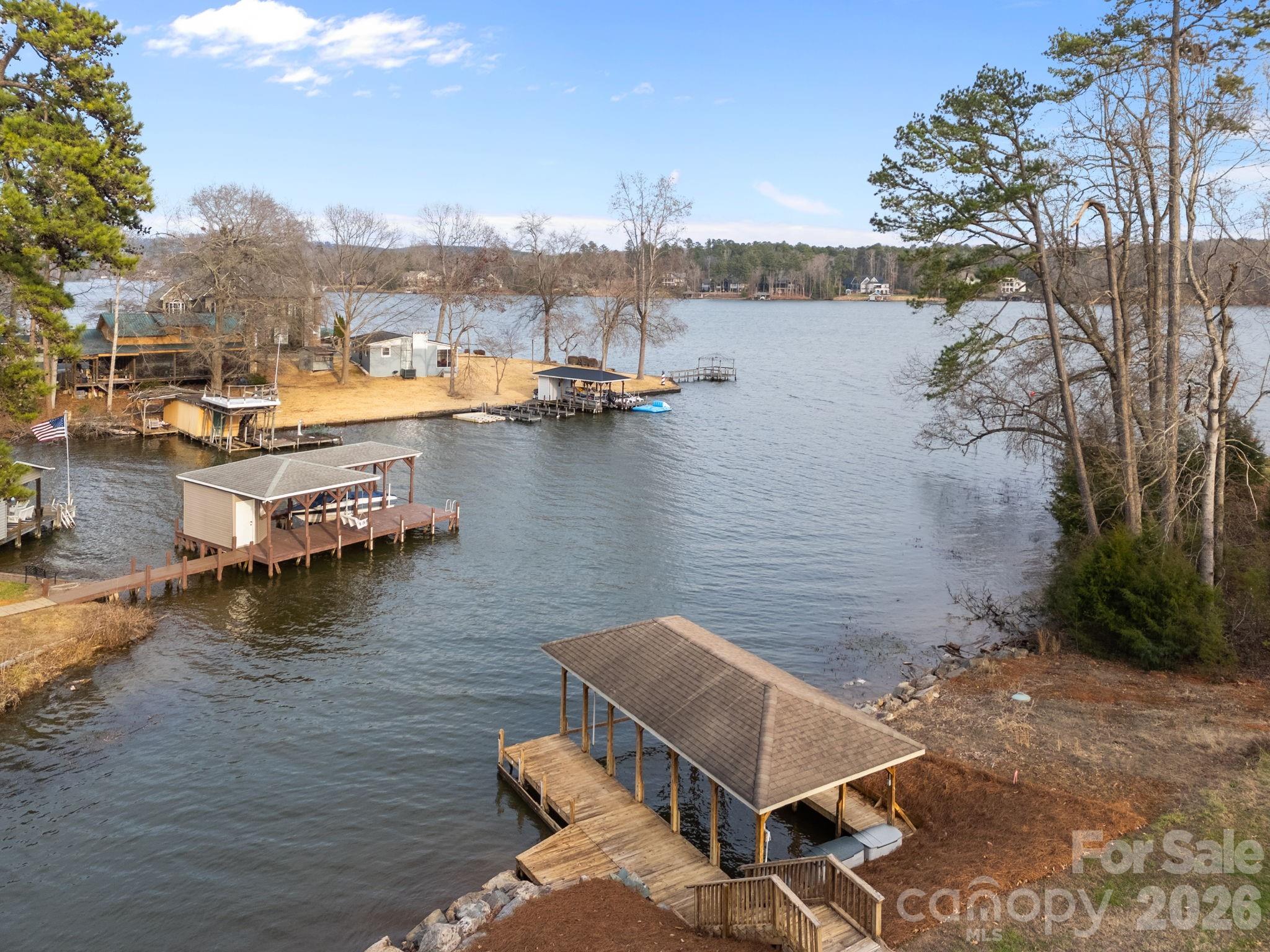 49449 River Run Road Albemarle, NC 28001 - Photo 38 of 45 a view of a lake with houses