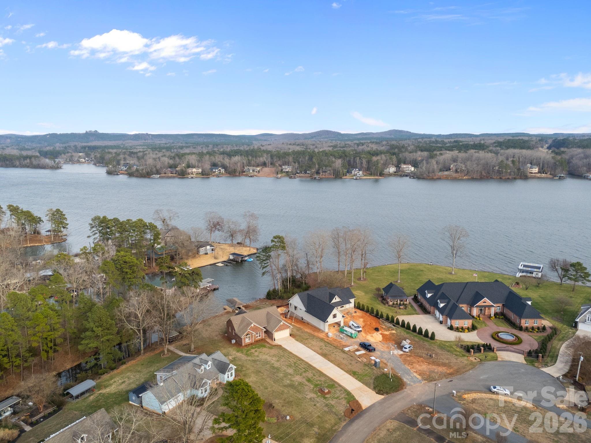 49449 River Run Road Albemarle, NC 28001 - Photo 39 of 45 a view of a lake with a mountain