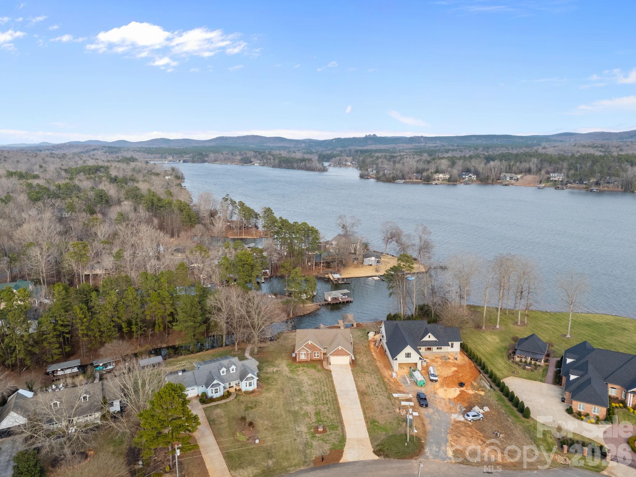 49449 River Run Road Albemarle, NC 28001 - Photo 40 of 45 an aerial view of a house with a lake view
