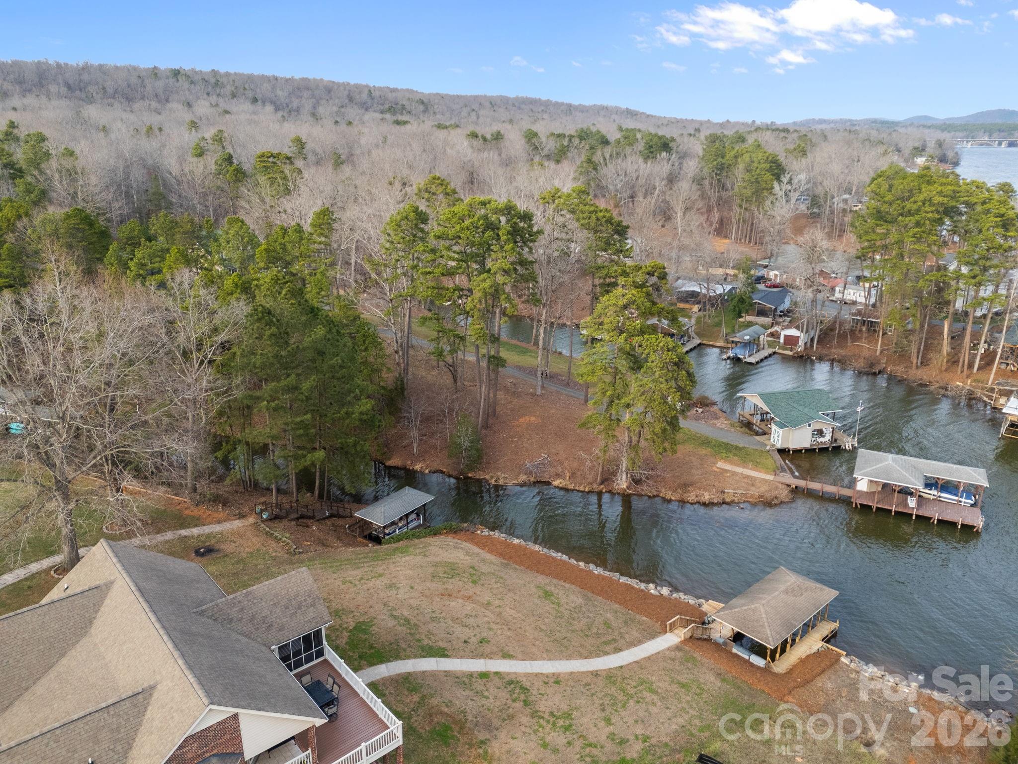 49449 River Run Road Albemarle, NC 28001 - Photo 41 of 45 an aerial view of a house with a yard basket ball court and outdoor seating