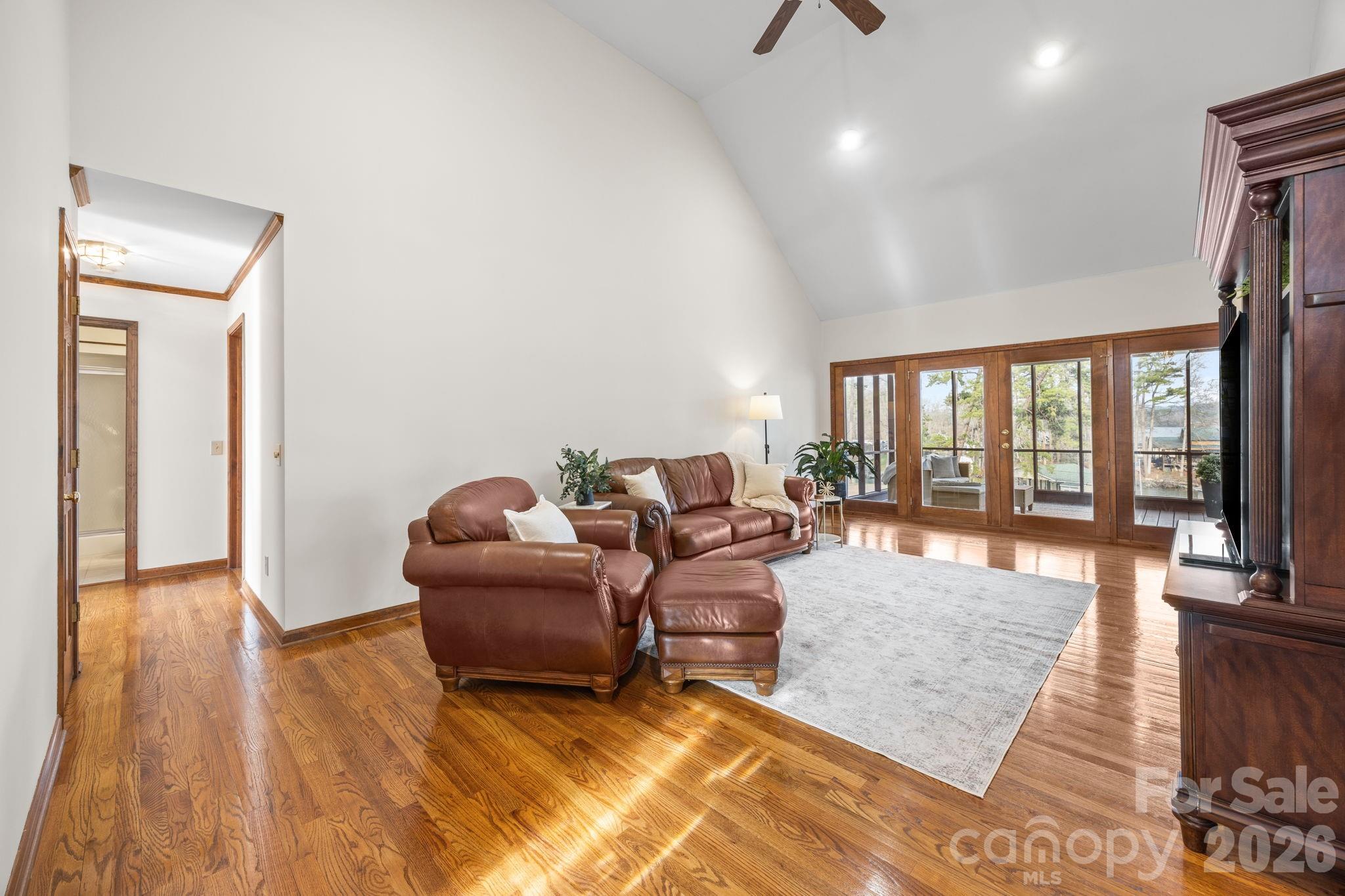 49449 River Run Road Albemarle, NC 28001 - Photo 5 of 45 a living room with furniture and a floor to ceiling window