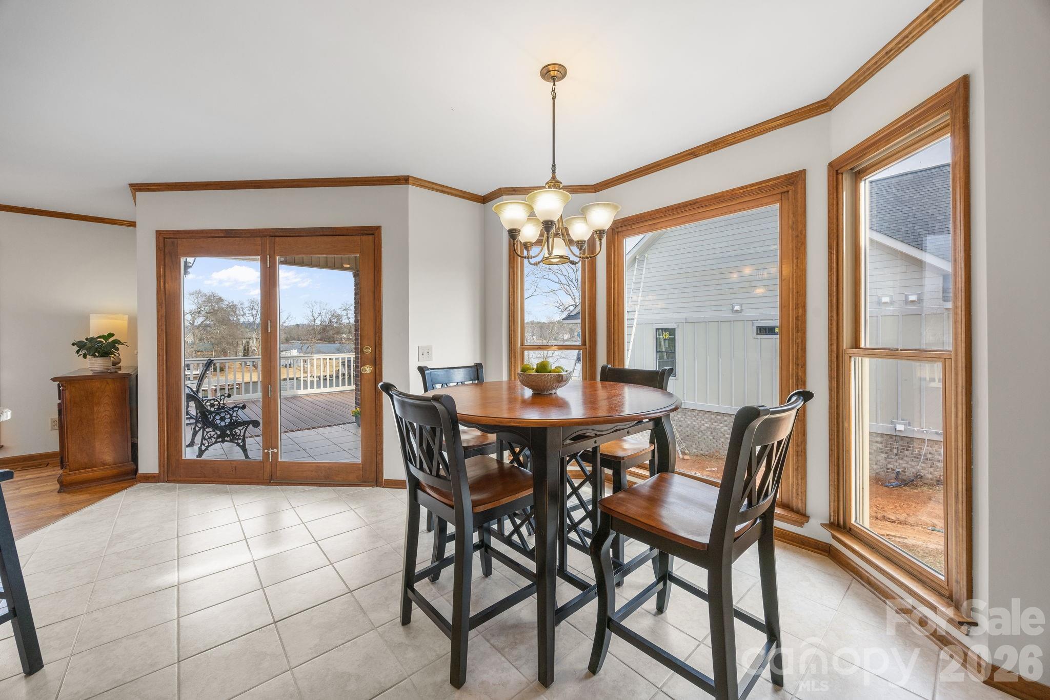 49449 River Run Road Albemarle, NC 28001 - Photo 10 of 45 a view of a dining room with furniture window and outside view