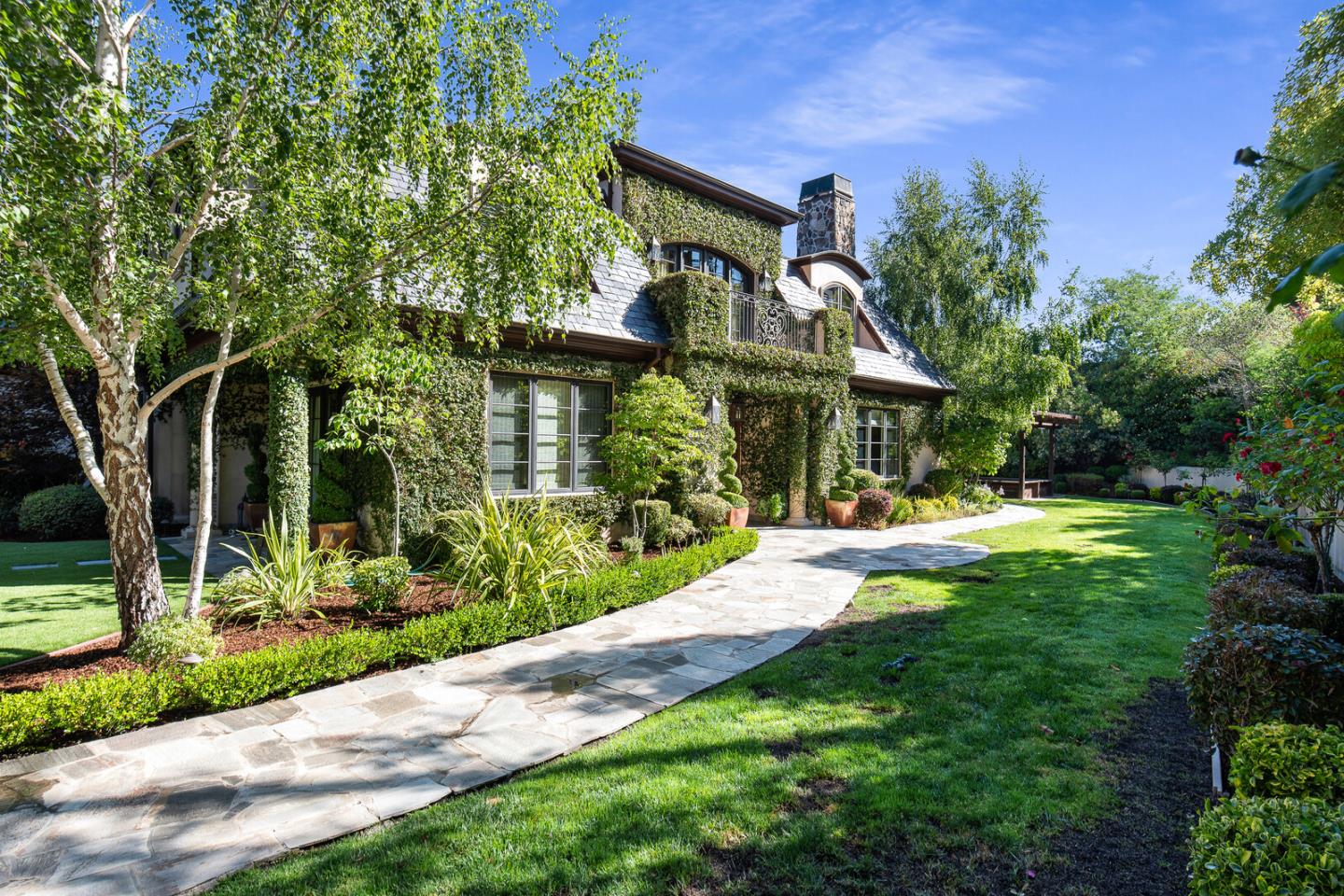 910 Link Road Hillsborough, CA 94010 - Photo 1 of 37 a view of a house with a yard and tree s