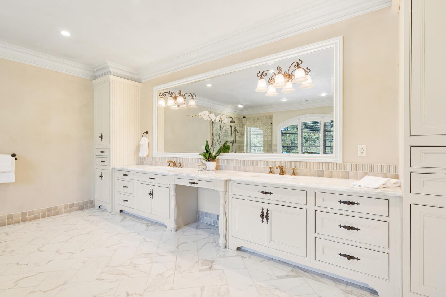 910 Link Road Hillsborough, CA 94010 - Photo 19 of 37 a large bathroom with a sink mirror and a