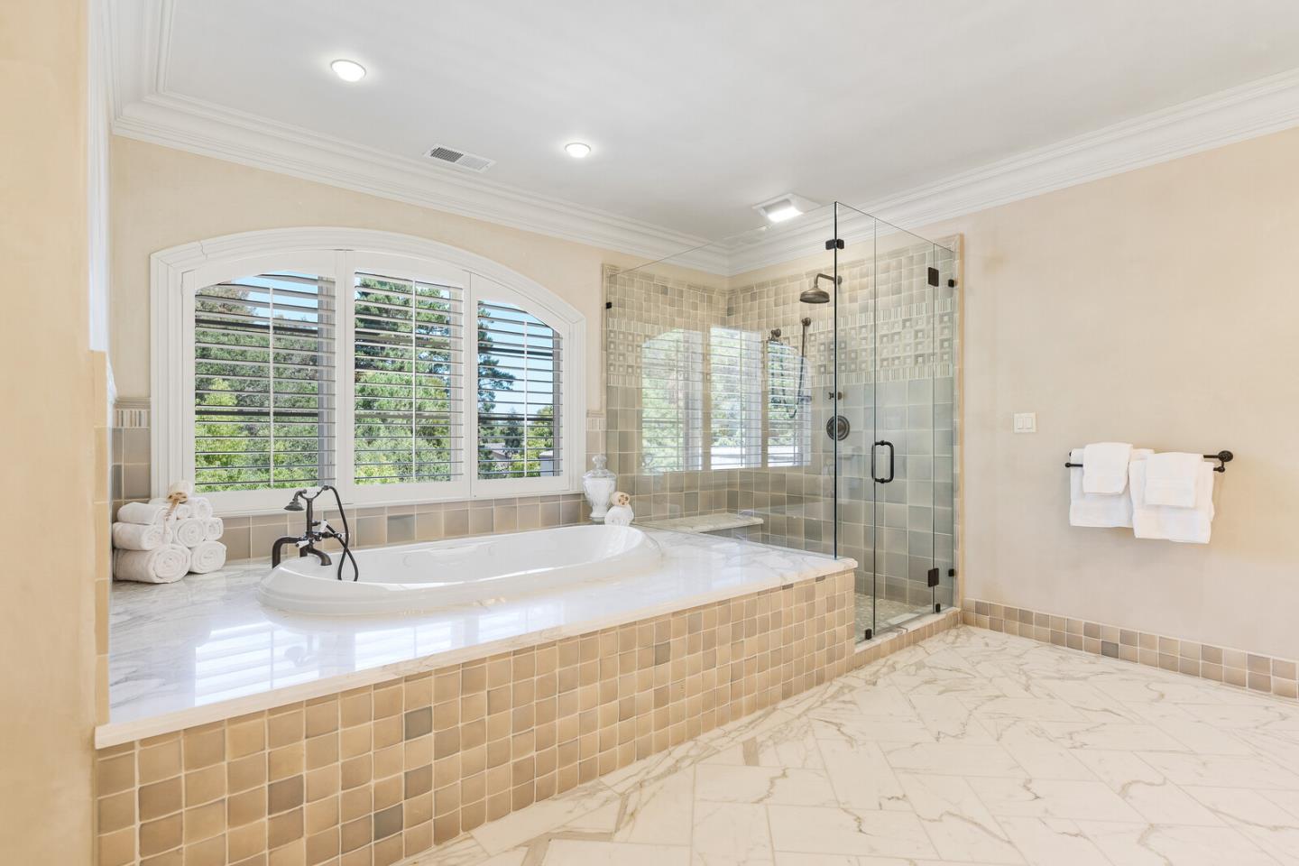 910 Link Road Hillsborough, CA 94010 - Photo 20 of 37 a spacious bathroom with a tub sink and mirror