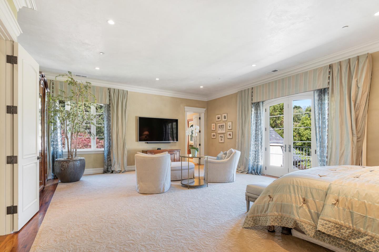 910 Link Road Hillsborough, CA 94010 - Photo 21 of 37 a bedroom with a bed and large window