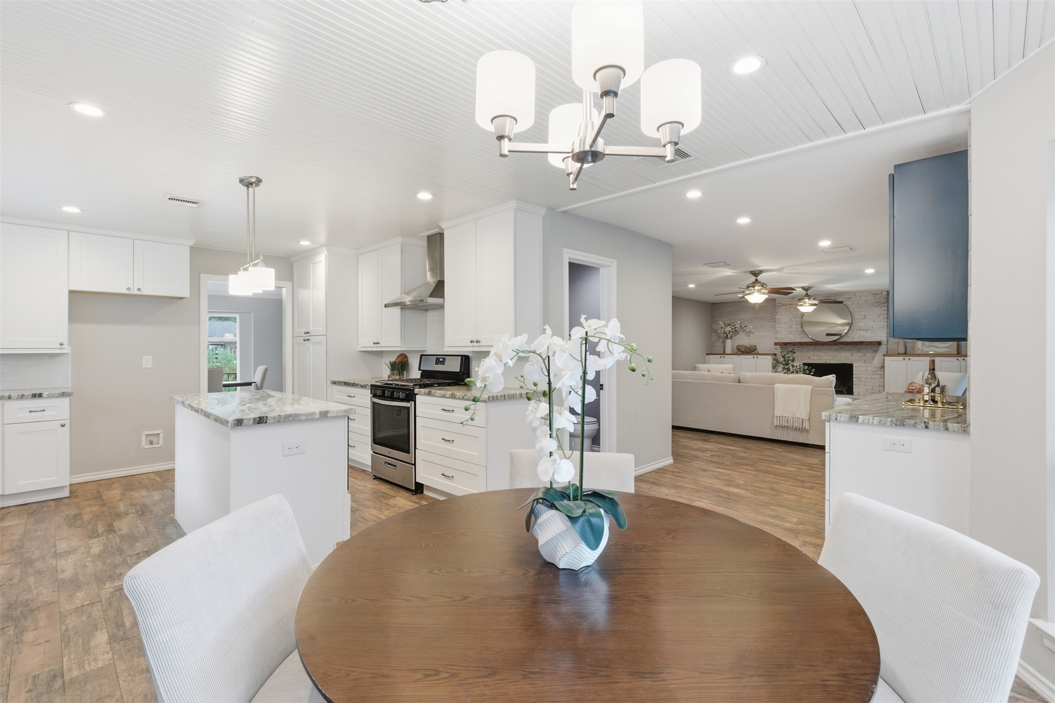8107 Twining Oaks Lane Spring, TX 77379 - Photo 13 of 41 a large kitchen with a table and chairs