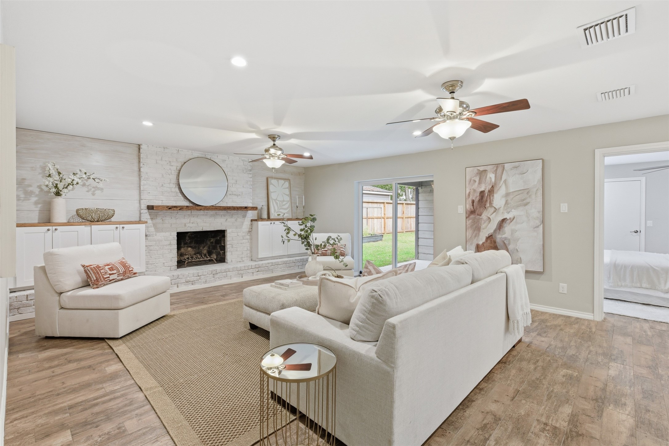 8107 Twining Oaks Lane Spring, TX 77379 - Photo 15 of 41 a living room with furniture a fireplace and a window