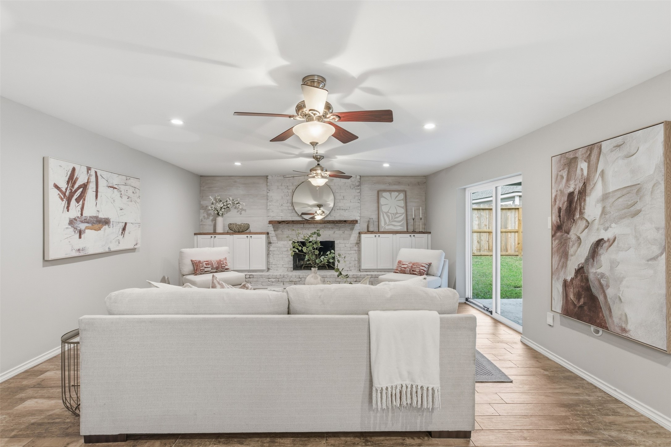 8107 Twining Oaks Lane Spring, TX 77379 - Photo 16 of 41 a living room with furniture and a chandelier