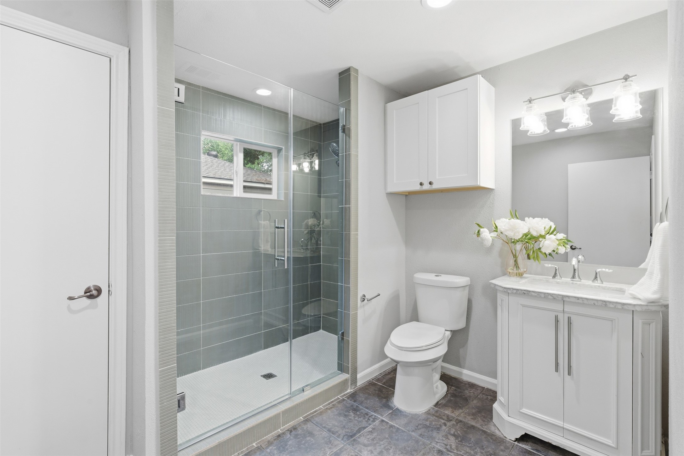 8107 Twining Oaks Lane Spring, TX 77379 - Photo 19 of 41 a bathroom with a shower a toilet and a sink