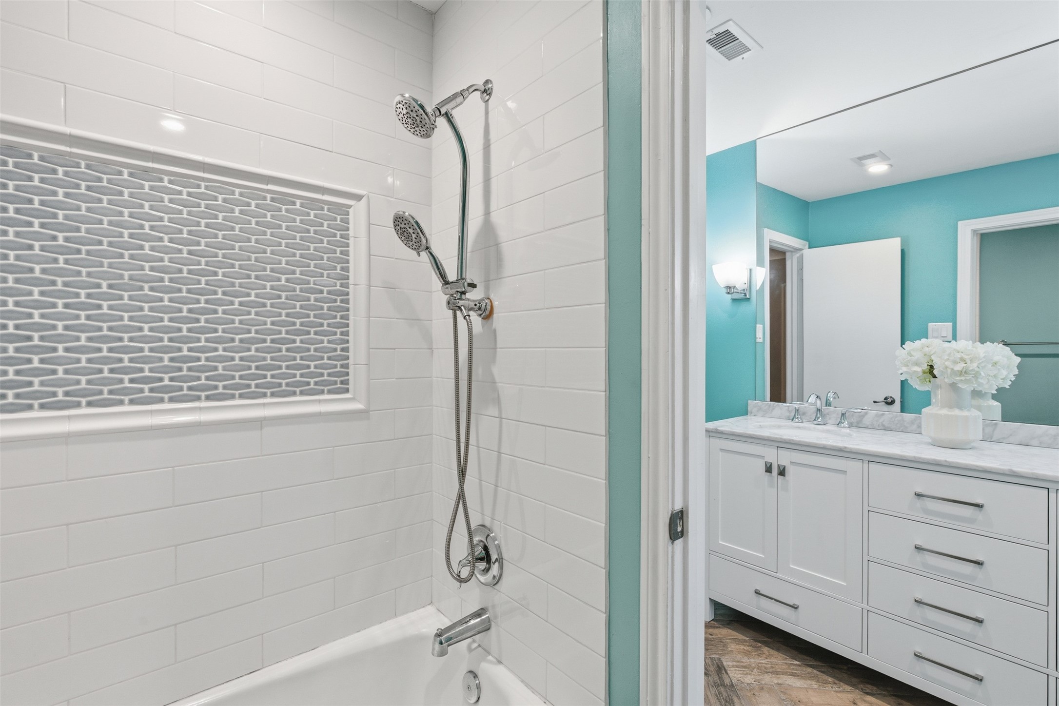 8107 Twining Oaks Lane Spring, TX 77379 - Photo 28 of 41 a bathroom with a bathtub and a sink