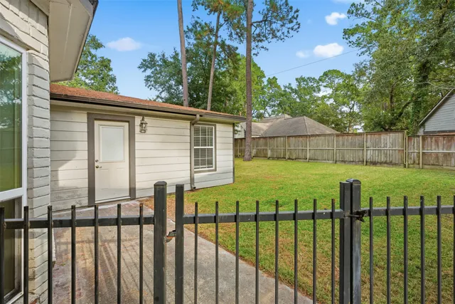 a view of a backyard with a garden