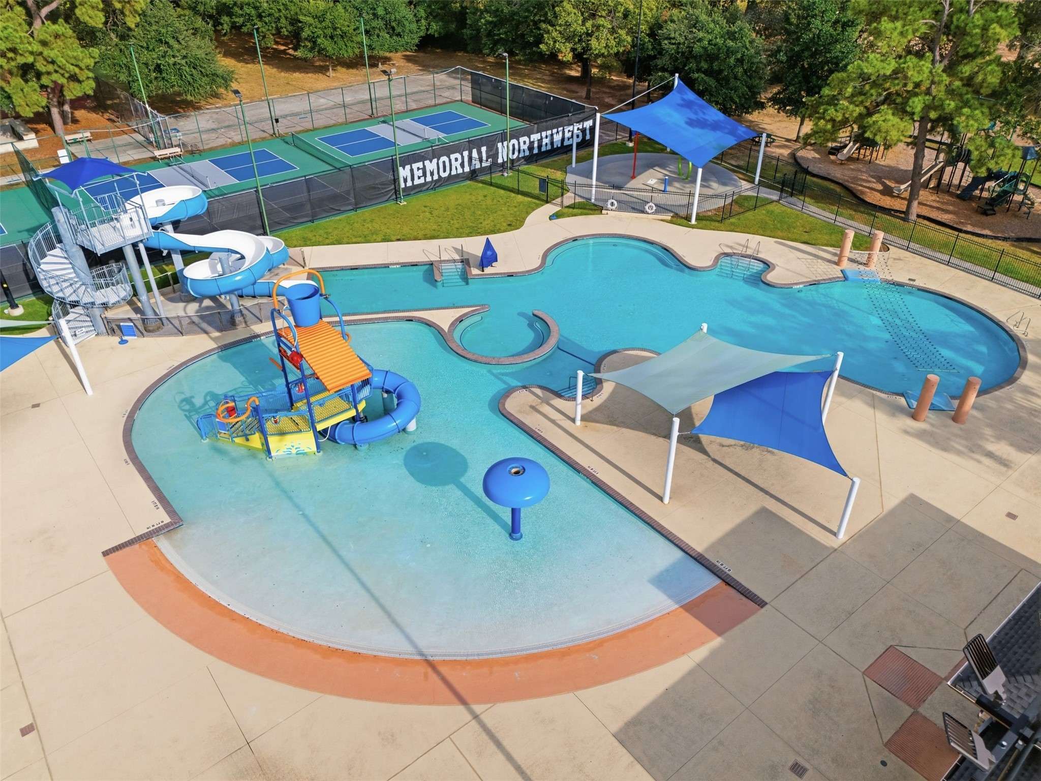 8107 Twining Oaks Lane Spring, TX 77379 - Photo 38 of 41 an aerial view of a swimming pool with outdoor seating
